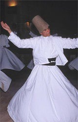 Sufi holy men, called dirvishes performing the whirling Sema devotion