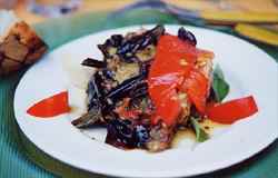Roasted aubergine and red peppers with fine olive oil and herbs.